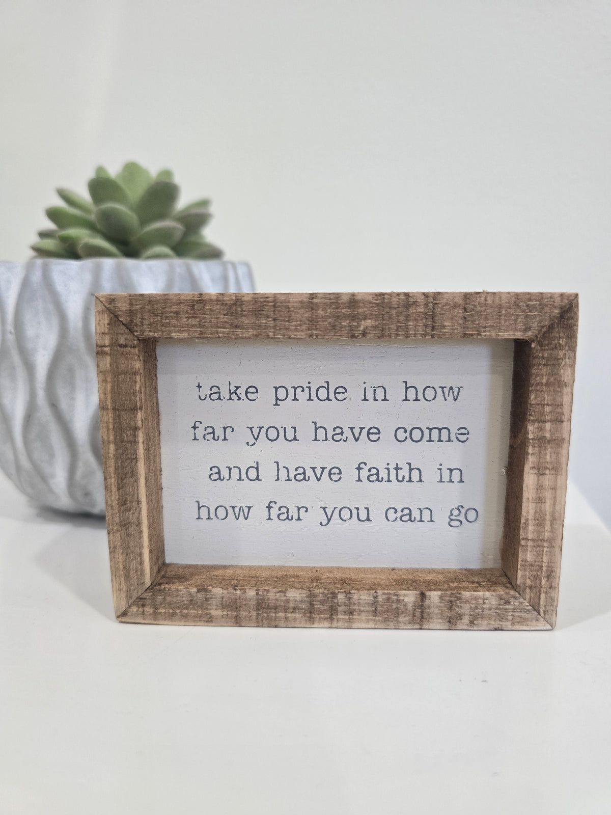 Take Pride and Have Faith block sign
